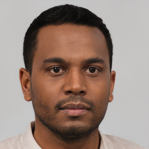 Neutral black young-adult male with short  black hair and brown eyes