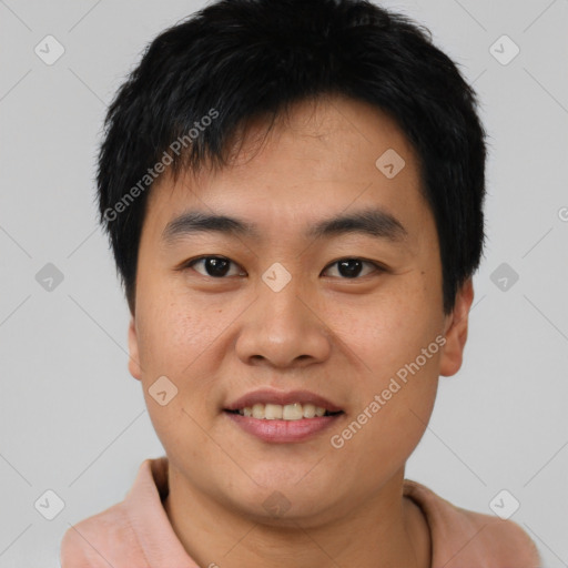 Joyful asian young-adult male with short  black hair and brown eyes