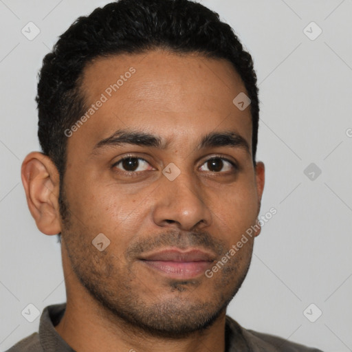 Joyful latino young-adult male with short  brown hair and brown eyes