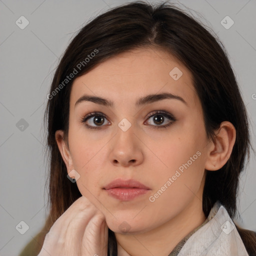 Neutral white young-adult female with medium  brown hair and brown eyes