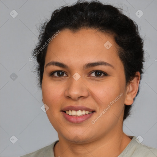 Joyful latino young-adult female with short  brown hair and brown eyes