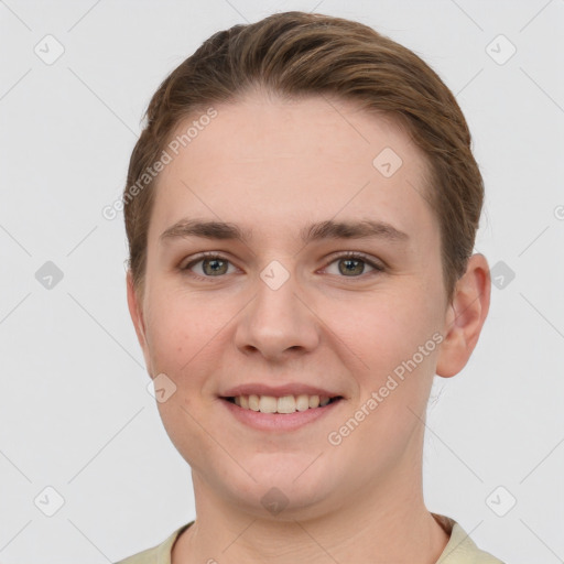 Joyful white young-adult female with short  brown hair and grey eyes