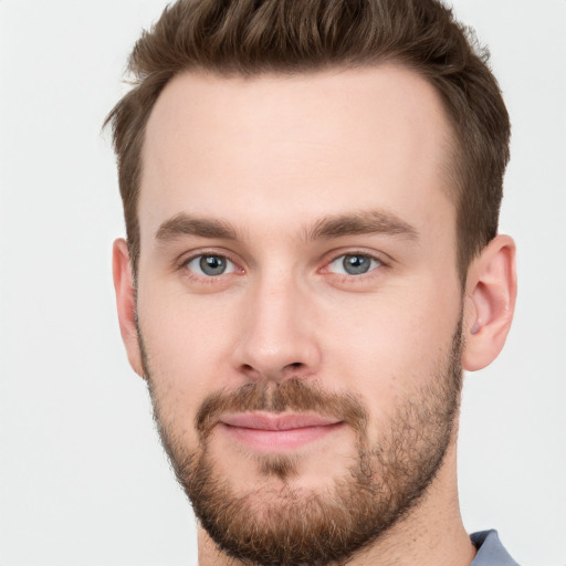 Neutral white young-adult male with short  brown hair and grey eyes