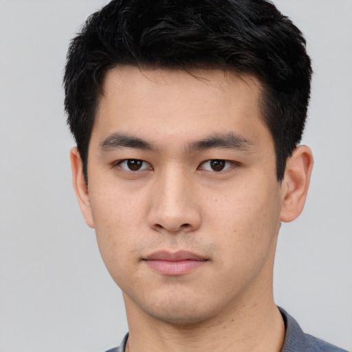 Neutral asian young-adult male with short  black hair and brown eyes