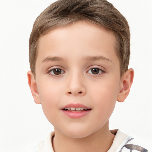 Joyful white child male with short  brown hair and brown eyes