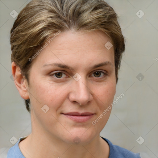 Joyful white young-adult female with short  brown hair and grey eyes