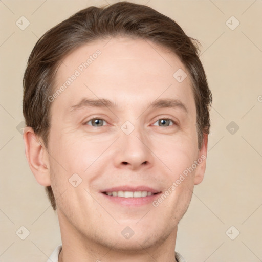 Joyful white adult male with short  brown hair and grey eyes