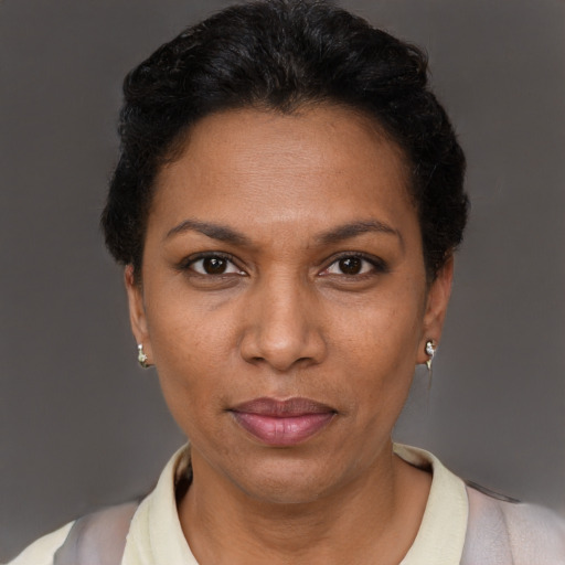Neutral black adult female with short  brown hair and brown eyes