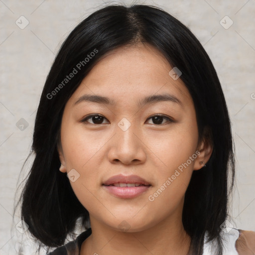 Joyful asian young-adult female with medium  black hair and brown eyes