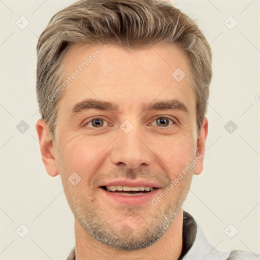 Joyful white adult male with short  brown hair and brown eyes