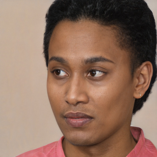 Neutral black young-adult female with short  black hair and brown eyes