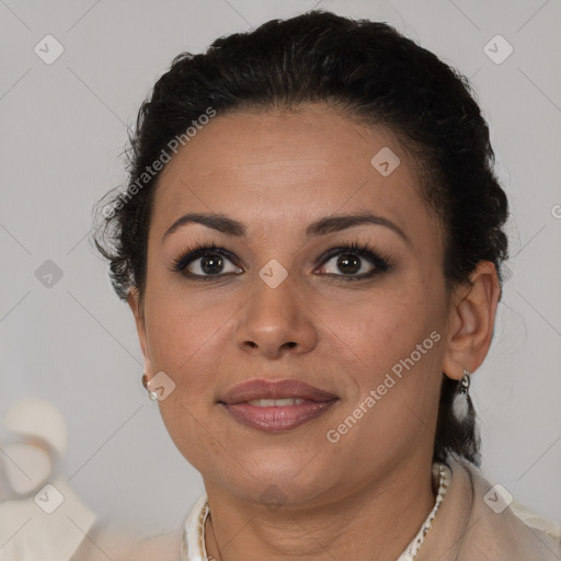 Joyful latino young-adult female with short  brown hair and brown eyes