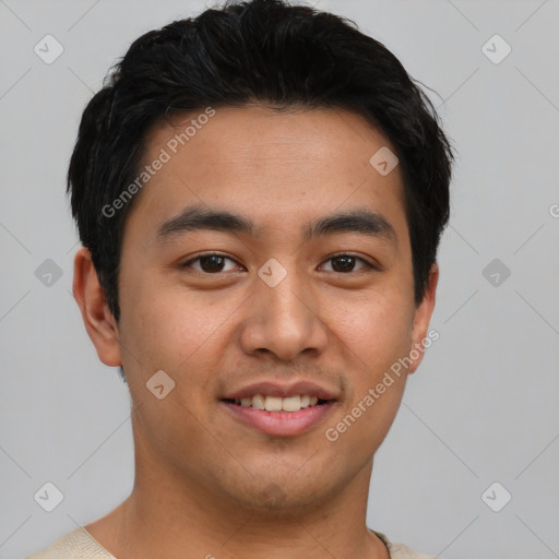 Joyful asian young-adult male with short  black hair and brown eyes