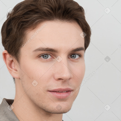 Neutral white young-adult male with short  brown hair and grey eyes