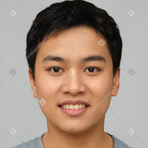 Joyful asian young-adult male with short  black hair and brown eyes