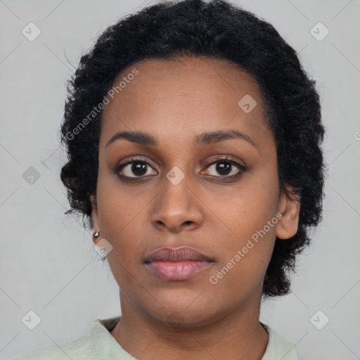 Neutral black young-adult female with short  black hair and brown eyes