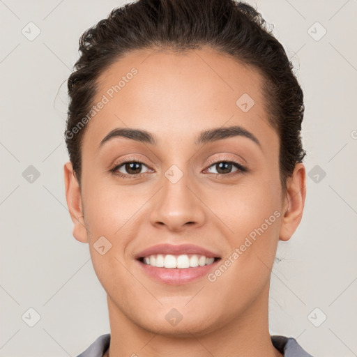 Joyful white young-adult female with short  brown hair and brown eyes