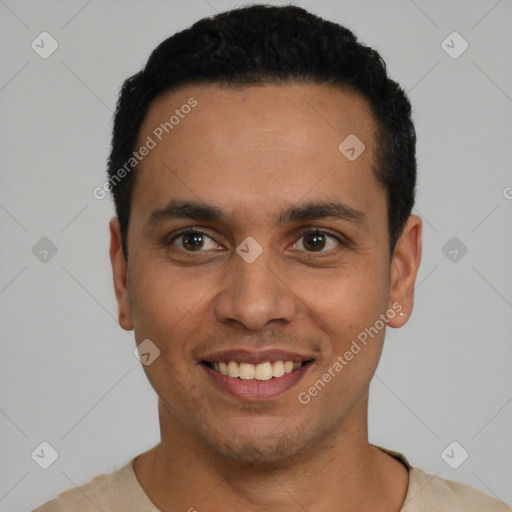 Joyful latino young-adult male with short  black hair and brown eyes