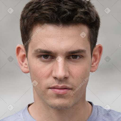 Neutral white young-adult male with short  brown hair and grey eyes