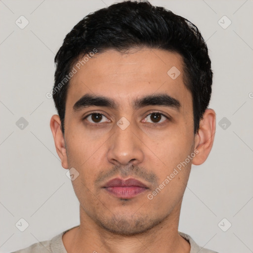 Neutral latino young-adult male with short  black hair and brown eyes