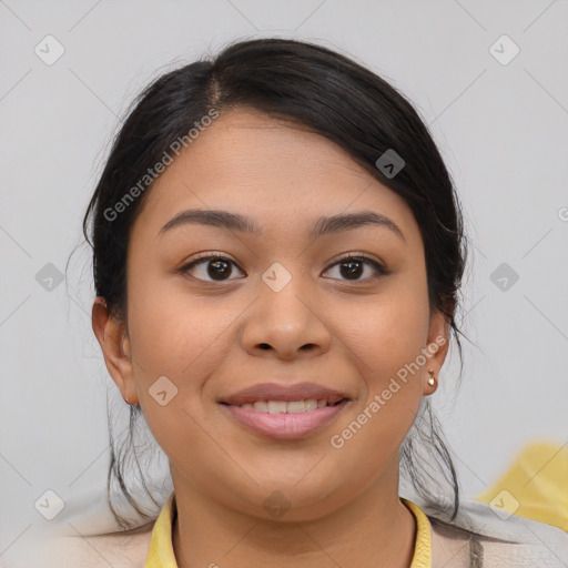 Joyful latino young-adult female with medium  brown hair and brown eyes