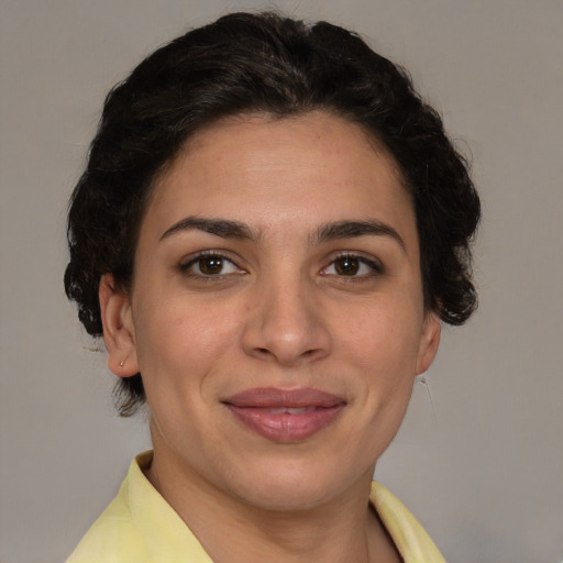 Joyful white adult female with short  brown hair and brown eyes