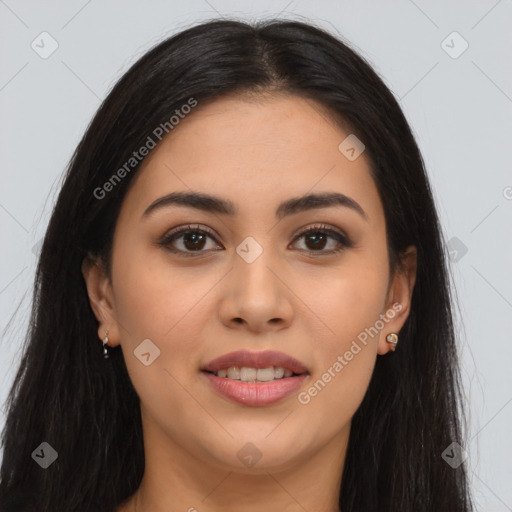 Joyful latino young-adult female with long  brown hair and brown eyes