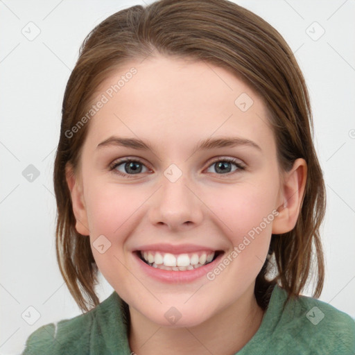 Joyful white young-adult female with medium  brown hair and blue eyes