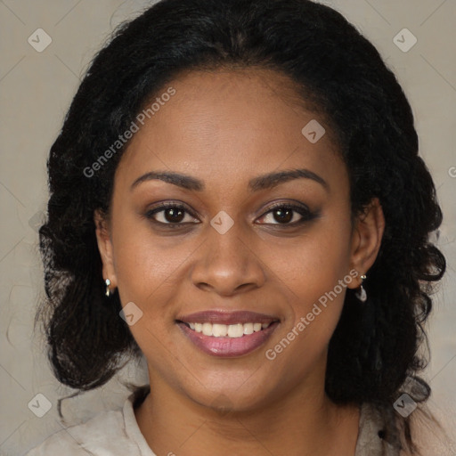 Joyful black young-adult female with long  brown hair and brown eyes