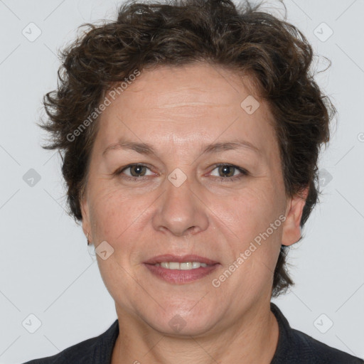 Joyful white adult female with short  brown hair and brown eyes