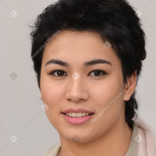 Joyful asian young-adult female with short  black hair and brown eyes