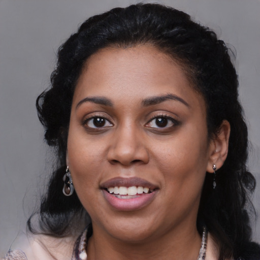 Joyful latino young-adult female with medium  black hair and brown eyes