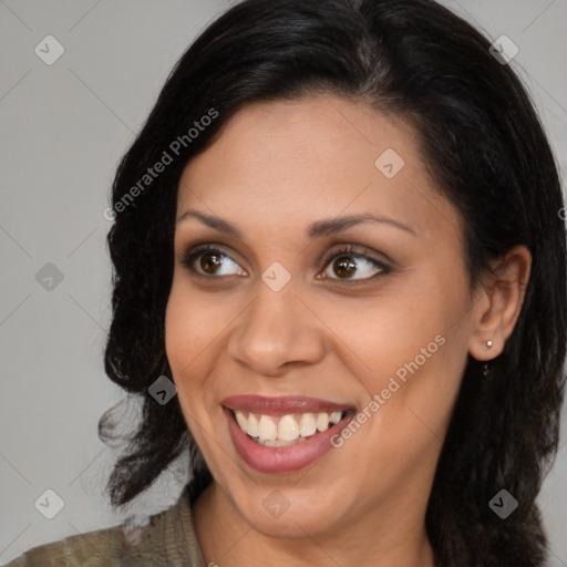 Joyful latino young-adult female with medium  brown hair and brown eyes