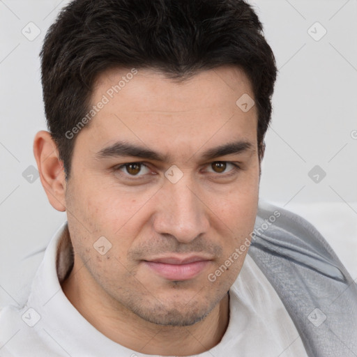 Joyful white young-adult male with short  brown hair and brown eyes