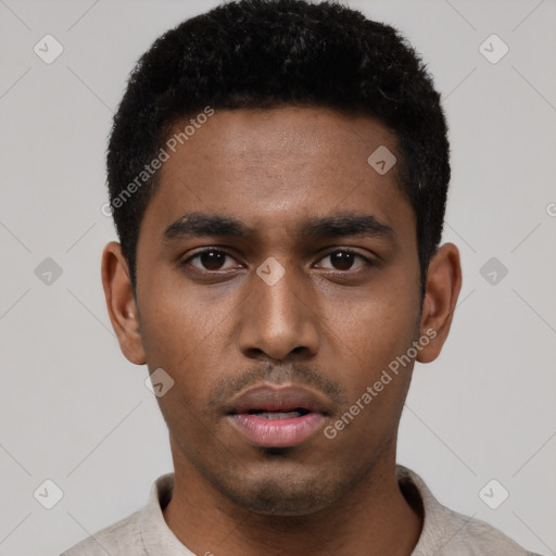 Neutral black young-adult male with short  black hair and brown eyes