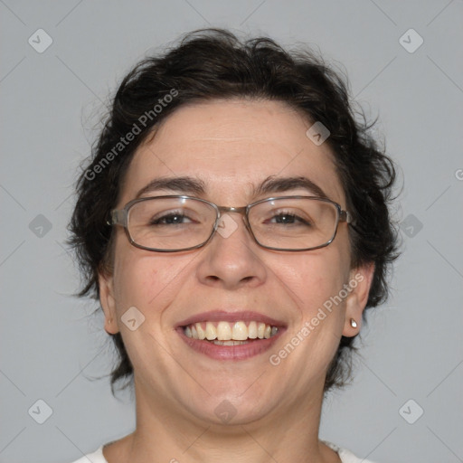 Joyful white adult male with medium  brown hair and brown eyes