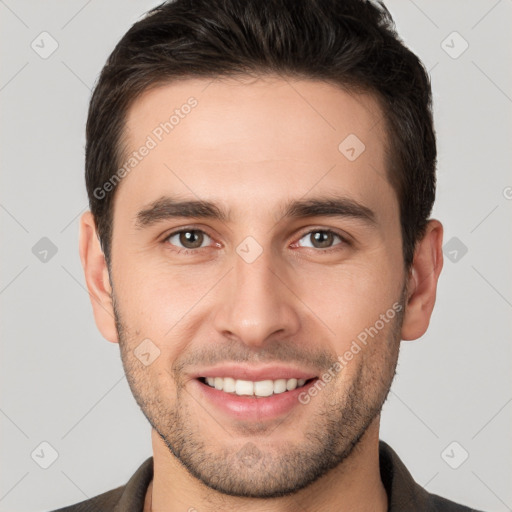 Joyful white young-adult male with short  brown hair and brown eyes