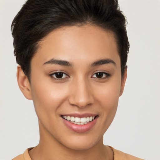 Joyful white young-adult female with short  brown hair and brown eyes