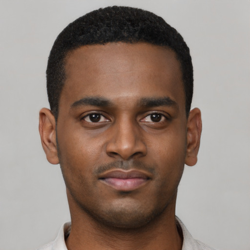 Neutral black young-adult male with short  black hair and brown eyes