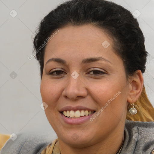 Joyful white adult female with short  brown hair and brown eyes