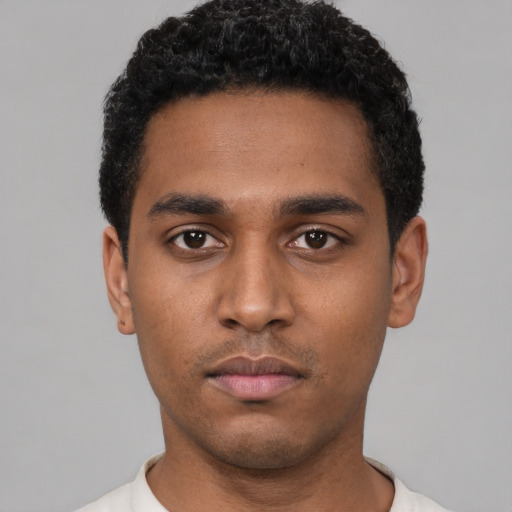 Neutral black young-adult male with short  black hair and brown eyes