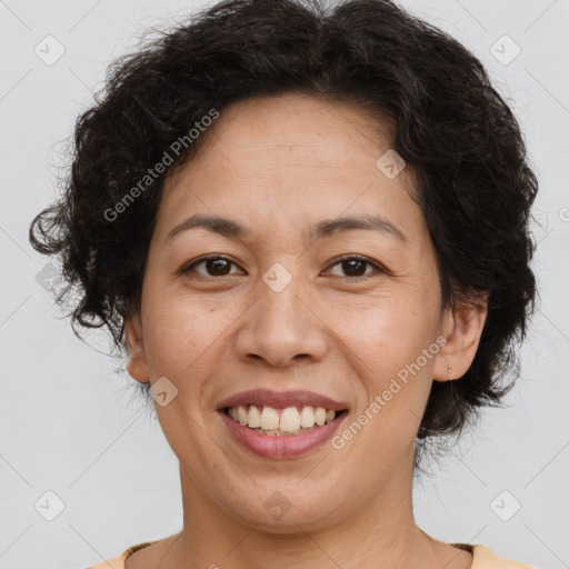 Joyful white adult female with short  brown hair and brown eyes