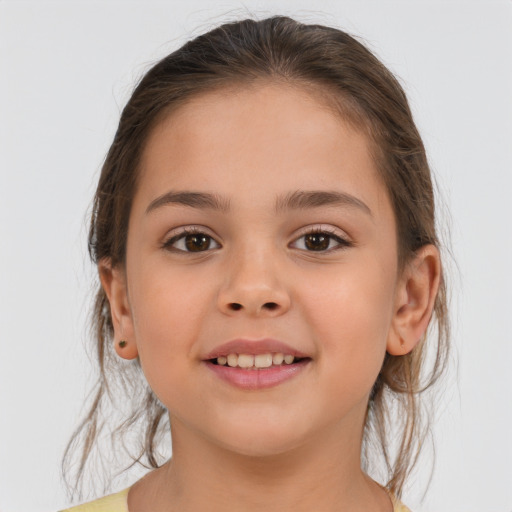 Joyful white child female with medium  brown hair and brown eyes