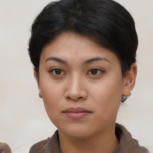 Neutral asian young-adult female with short  brown hair and brown eyes