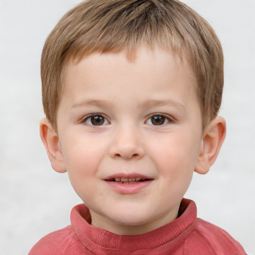 Joyful white child male with short  brown hair and brown eyes