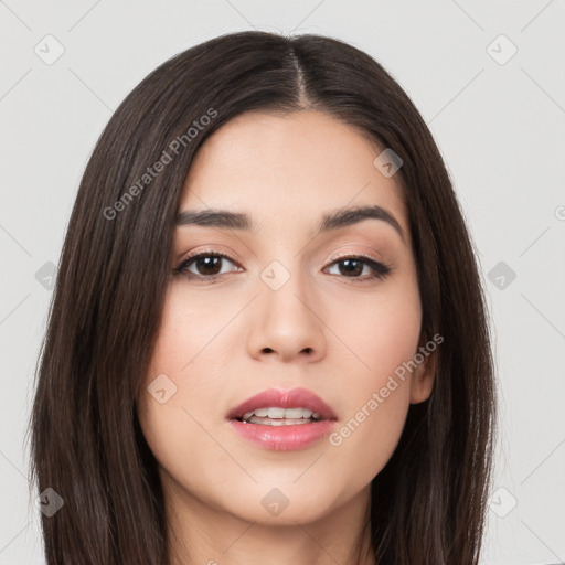 Joyful asian young-adult female with long  brown hair and brown eyes