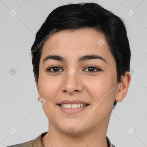 Joyful latino young-adult female with short  black hair and brown eyes