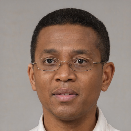 Neutral black adult male with short  black hair and brown eyes