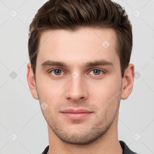 Neutral white young-adult male with short  brown hair and grey eyes