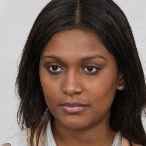 Neutral asian young-adult female with long  brown hair and brown eyes
